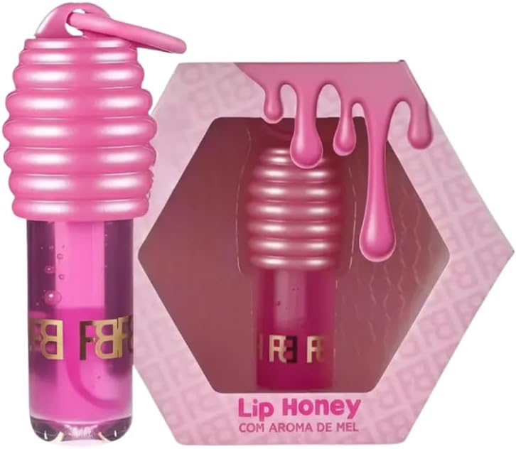 Gloss Lady Labial Lip Honey com Chaveiro e Vitamina E | by Fran Benefícios Extrato de mel e Vitamina E; Hidratação prolongada e ação antioxidante; Com aroma de mel; Ponteira Chubby, proporciona maior distribuição de produto nos lábios;