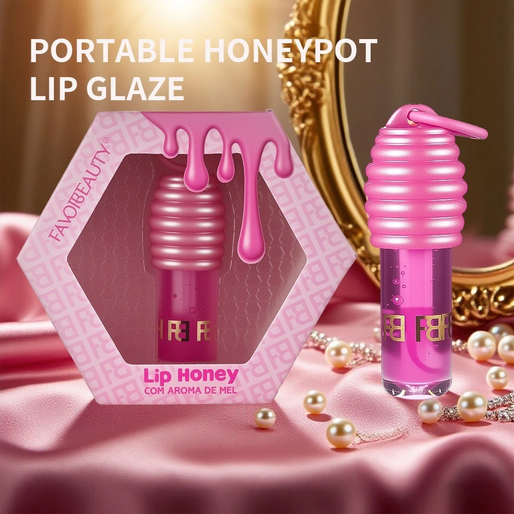 Gloss Lady Labial Lip Honey com Chaveiro e Vitamina E | by Fran Benefícios Extrato de mel e Vitamina E; Hidratação prolongada e ação antioxidante; Com aroma de mel; Ponteira Chubby, proporciona maior distribuição de produto nos lábios; - Imagem 2